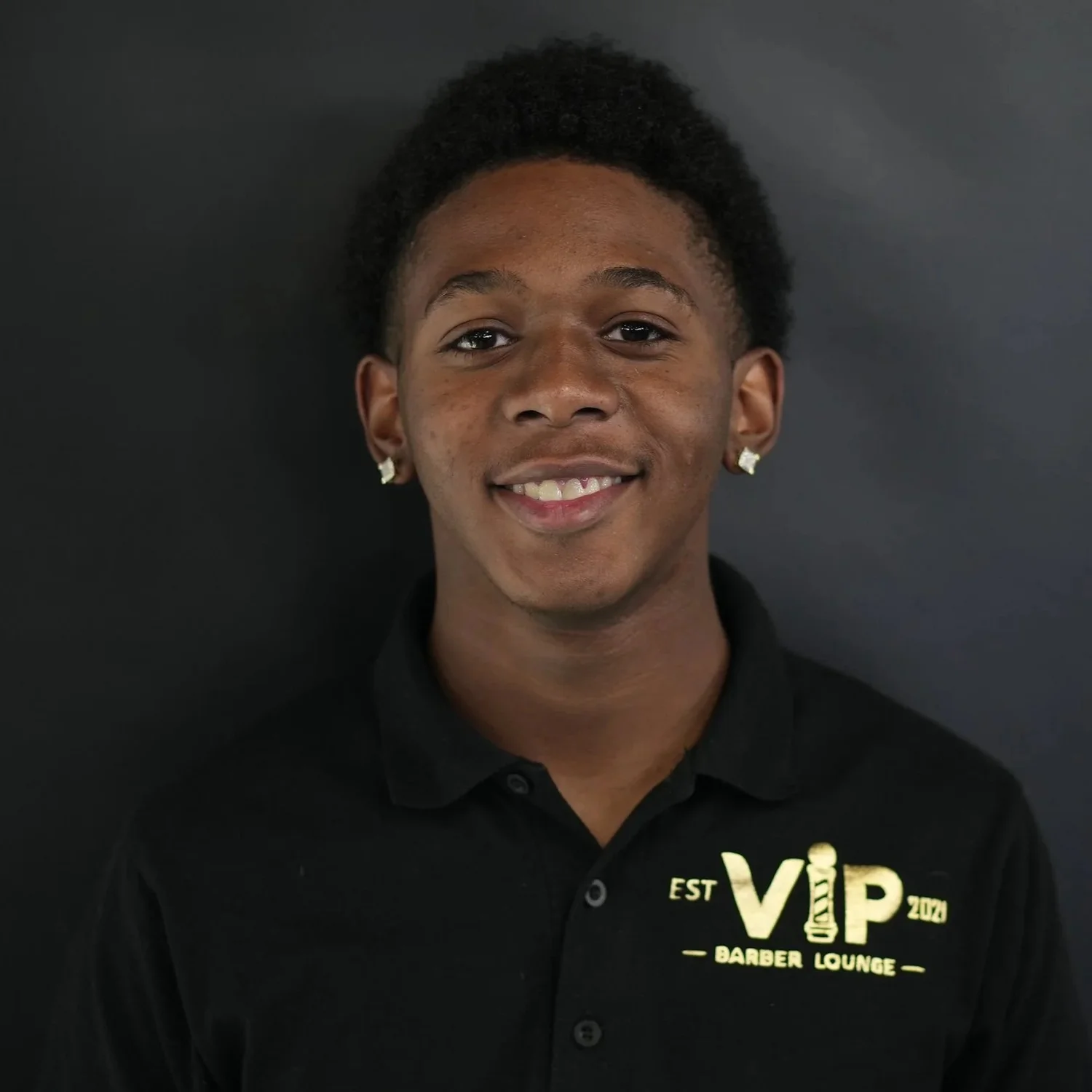Braelin, barber at VIP Barber Lounge Denver