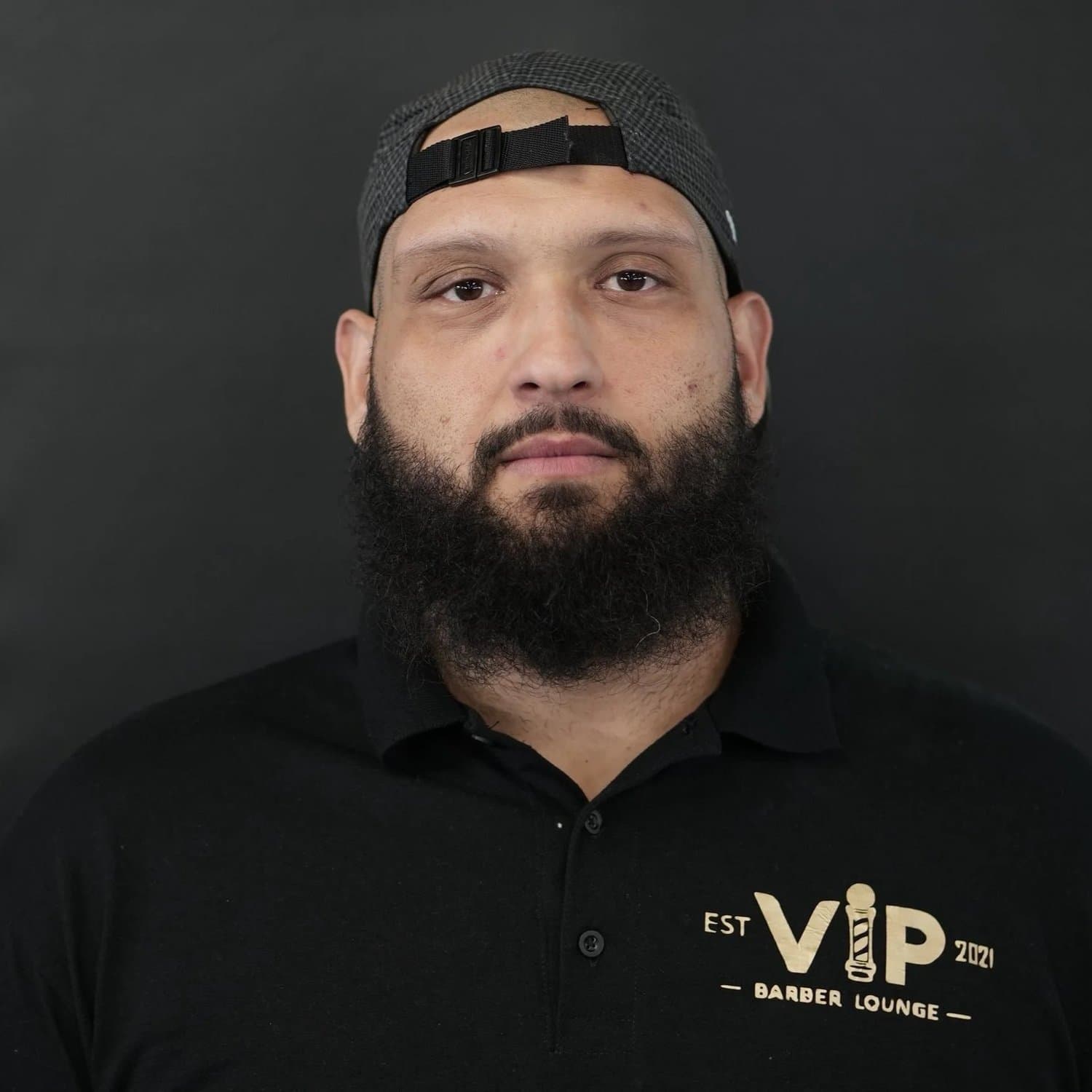 Khalid, barber at VIP Barber Lounge Aurora · South Aurora